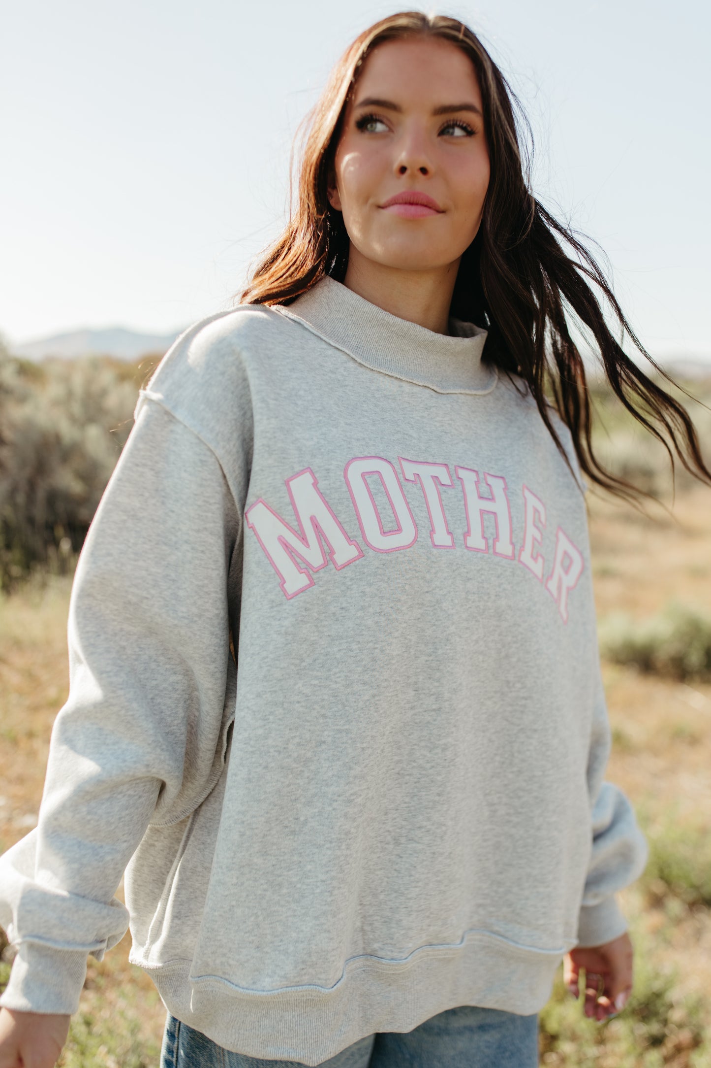 THE MOTHER MOCK NECK IN GREY AND PINK