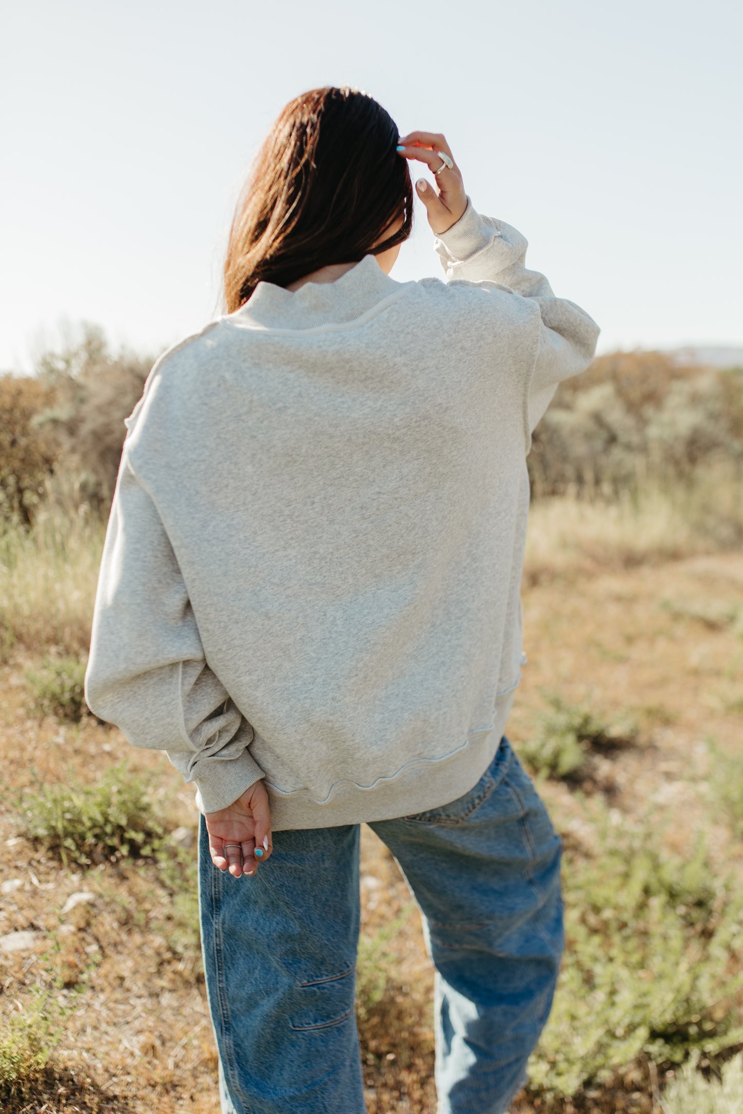 THE MOTHER MOCK NECK IN GREY AND PINK