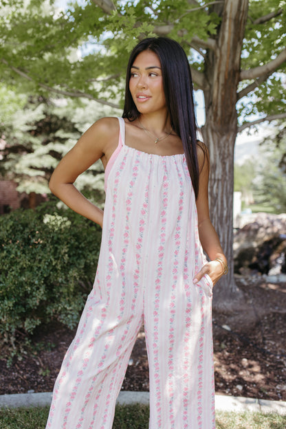 THE SERENITY STRIPE JUMPSUIT IN IVORY