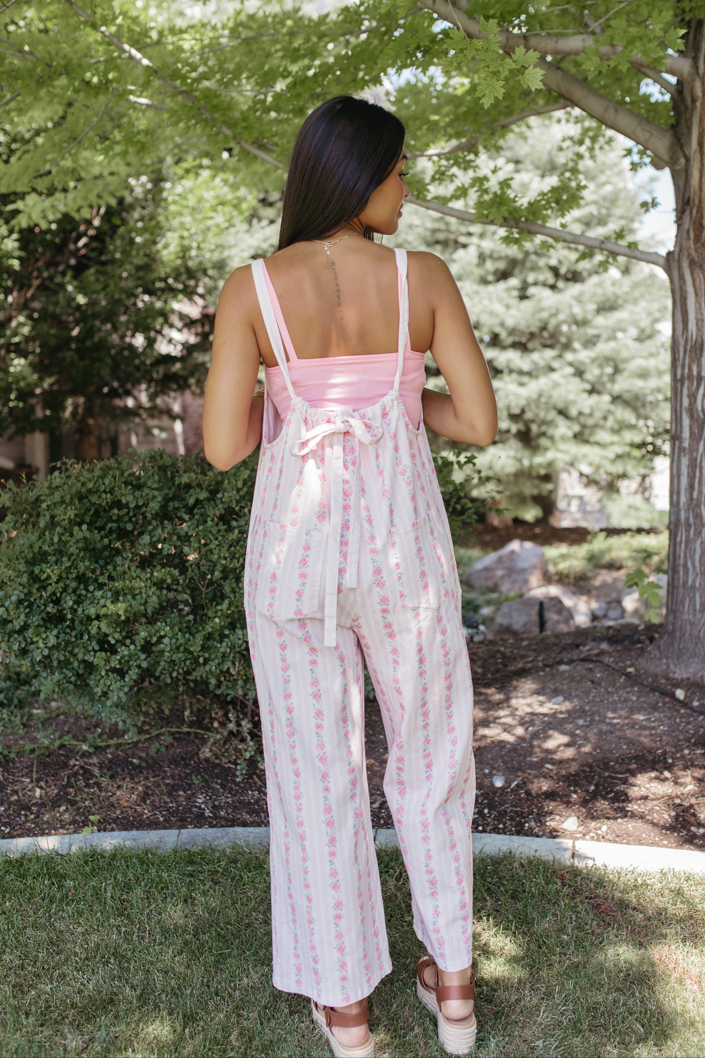 THE SERENITY STRIPE JUMPSUIT IN IVORY