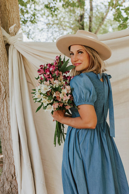 THE KENNEDY SMOCKED DRESS IN CHAMBRAY BY PINK DESERT