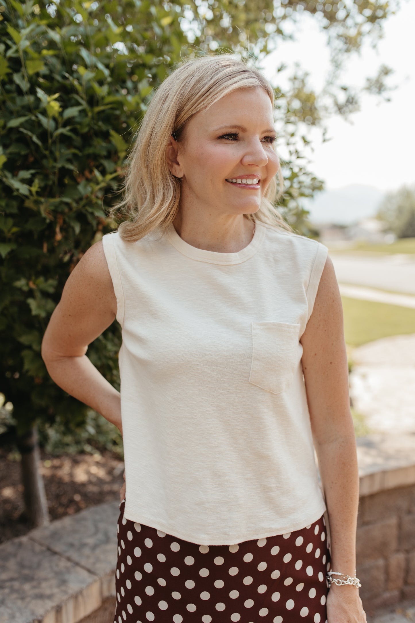 THE KHYLEE SLEEVELESS COTTON TOP IN OFF WHITE