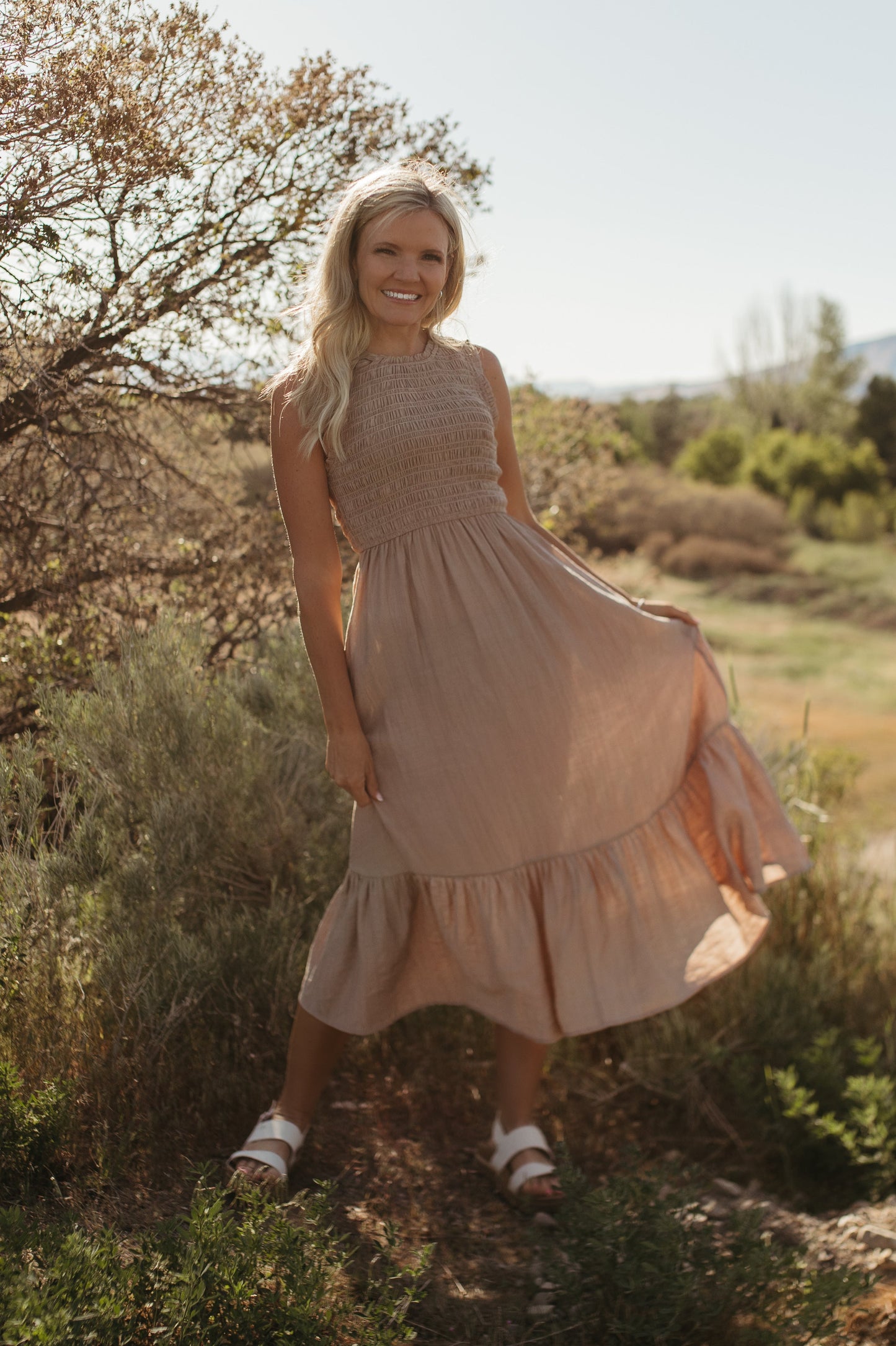 THE AUDREY SMOCKED MIDI DRESS IN SAND