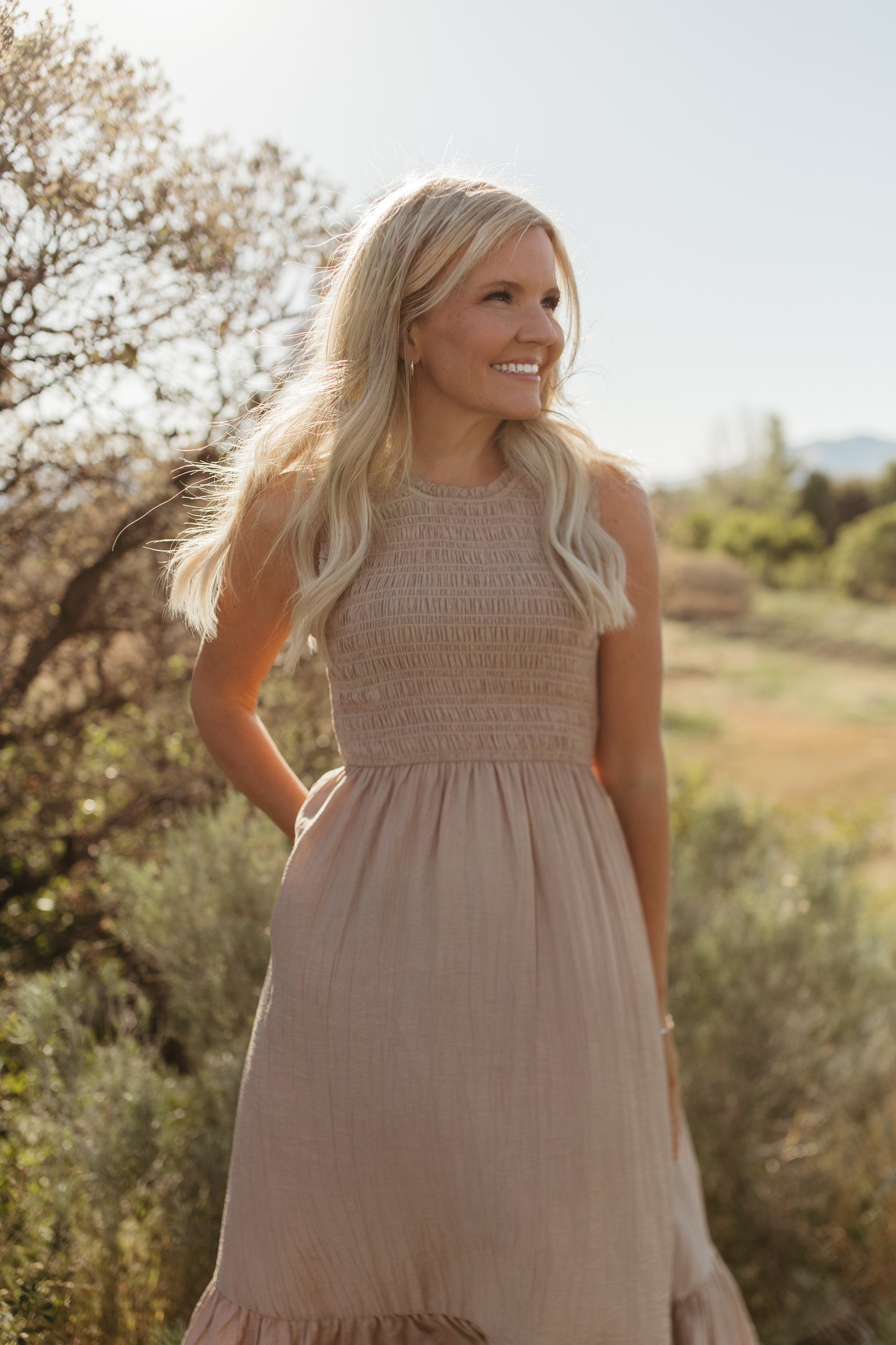 THE AUDREY SMOCKED MIDI DRESS IN SAND