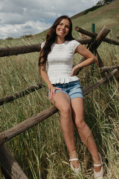 THE CLAUDIA RUCHED RUFFLED HEM TOP IN WHITE