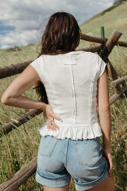 THE CLAUDIA RUCHED RUFFLED HEM TOP IN WHITE