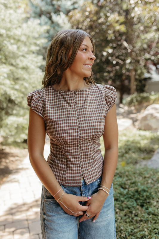 THE COLBIE PLAID PUFF SLEEVE BUTTON TOP IN DARK BROWN