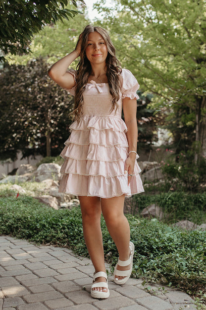 THE DULCE TIERED SMOCKED RUFFLE DRESS IN PINK Large