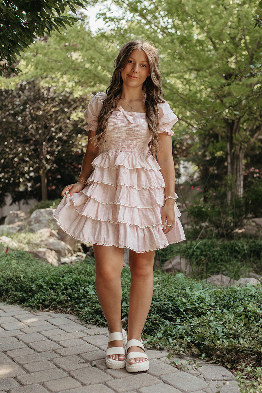 THE DULCE TIERED SMOCKED RUFFLE DRESS IN PINK