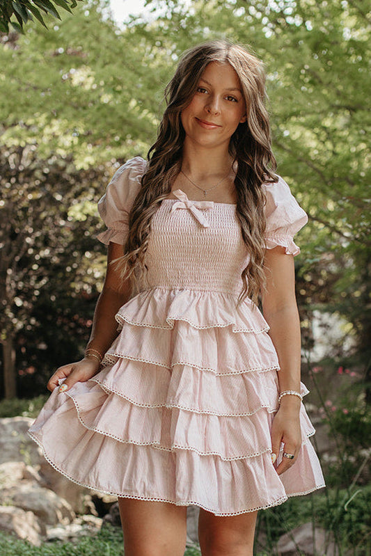 THE DULCE TIERED SMOCKED RUFFLE DRESS IN PINK