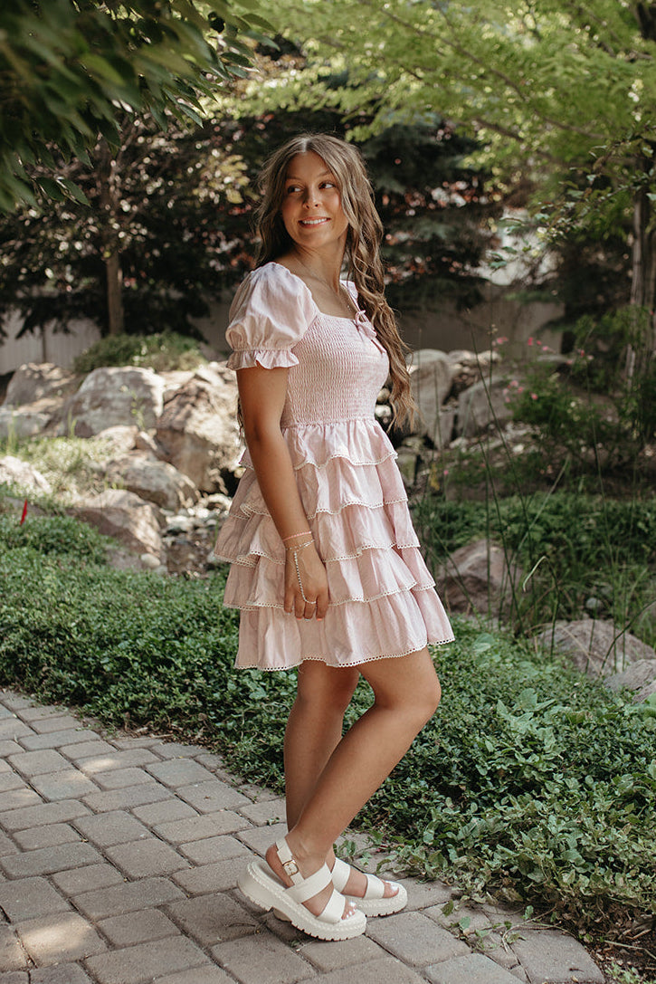 THE DULCE TIERED SMOCKED RUFFLE DRESS IN PINK