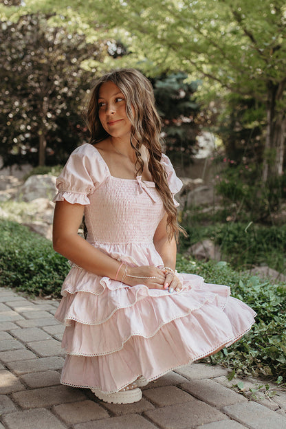 THE DULCE TIERED SMOCKED RUFFLE DRESS IN PINK