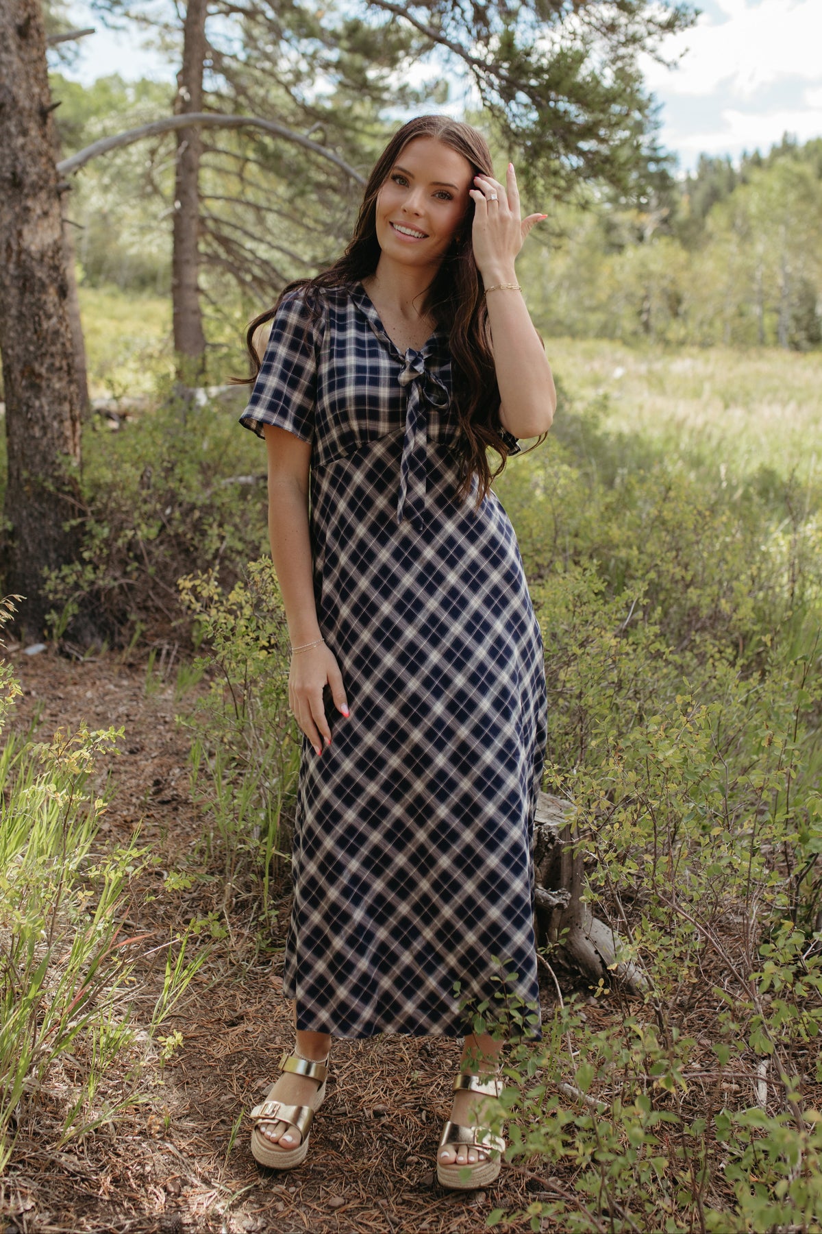 THE IVY PLAID MIDI V-NECK DRESS IN NAVY