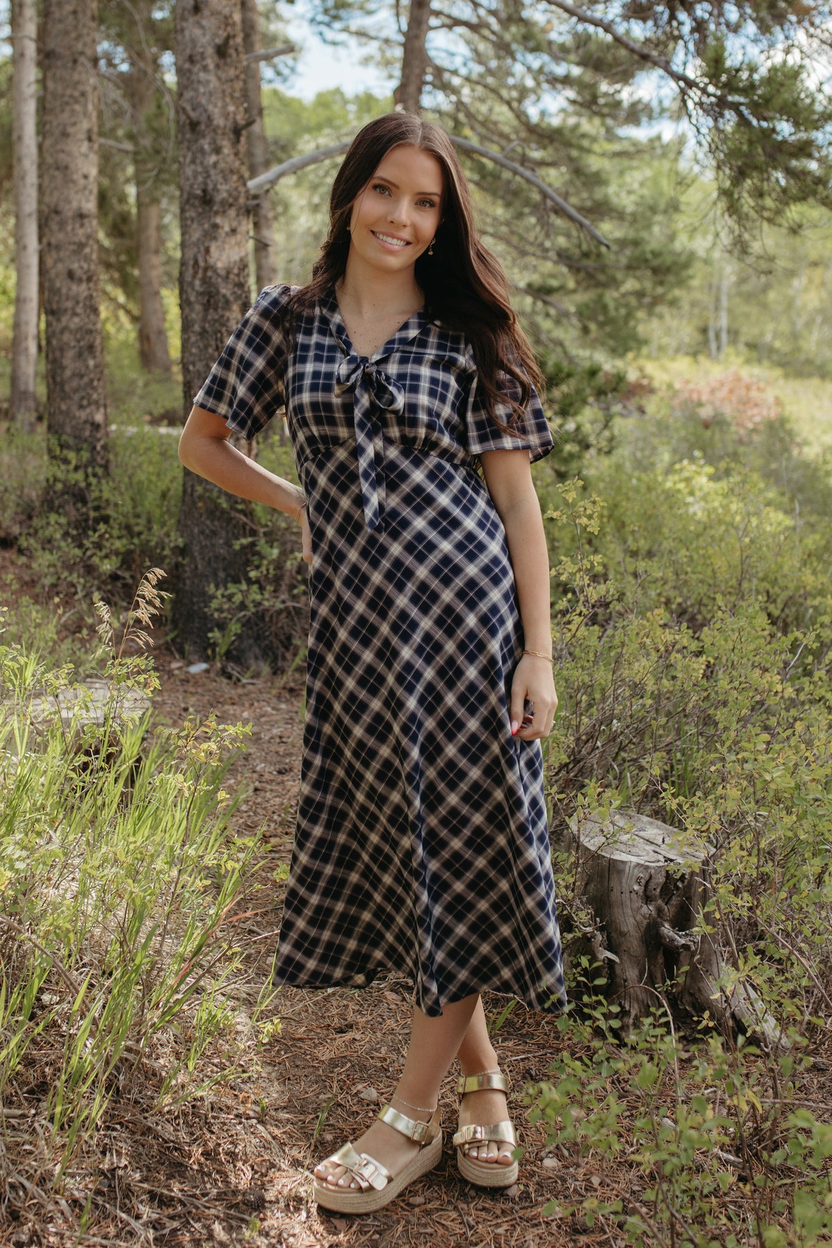 THE IVY PLAID MIDI V-NECK DRESS IN NAVY