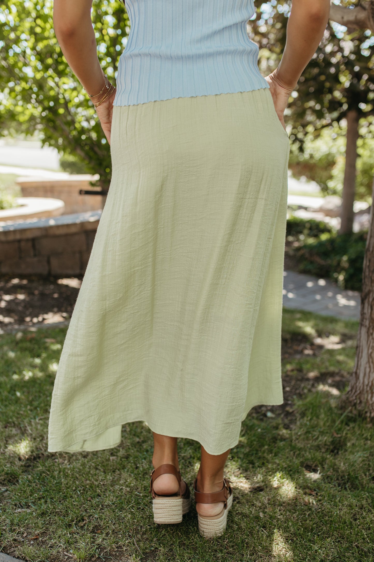 THE VADA GREEN BUTTON MIDI SKIRT