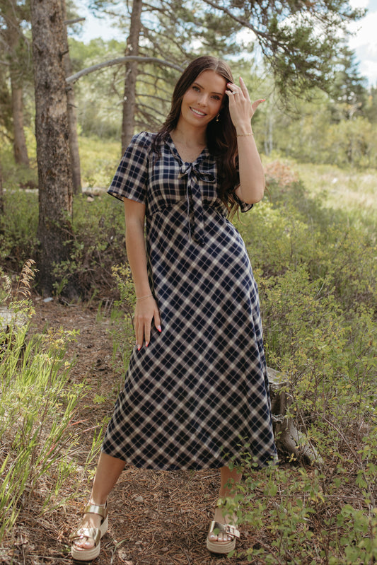 THE IVY PLAID MIDI V-NECK DRESS IN NAVY