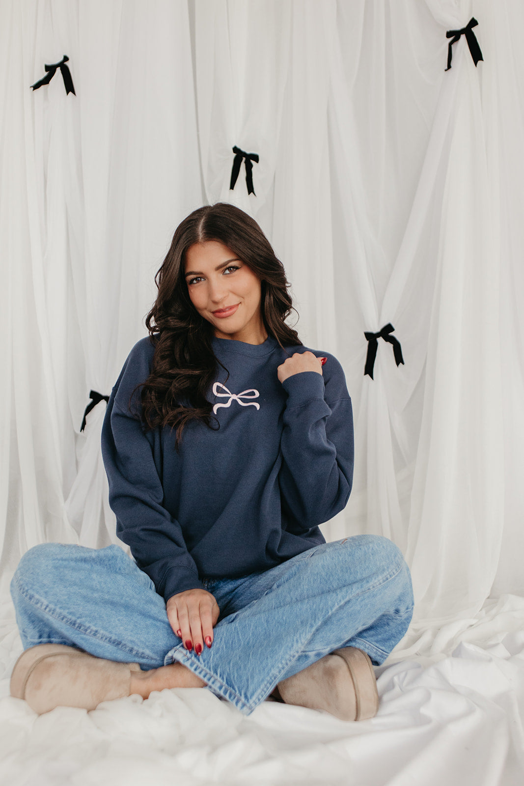 THE MILEY BOW EMBROIDERED SWEATSHIRT IN INDIGO