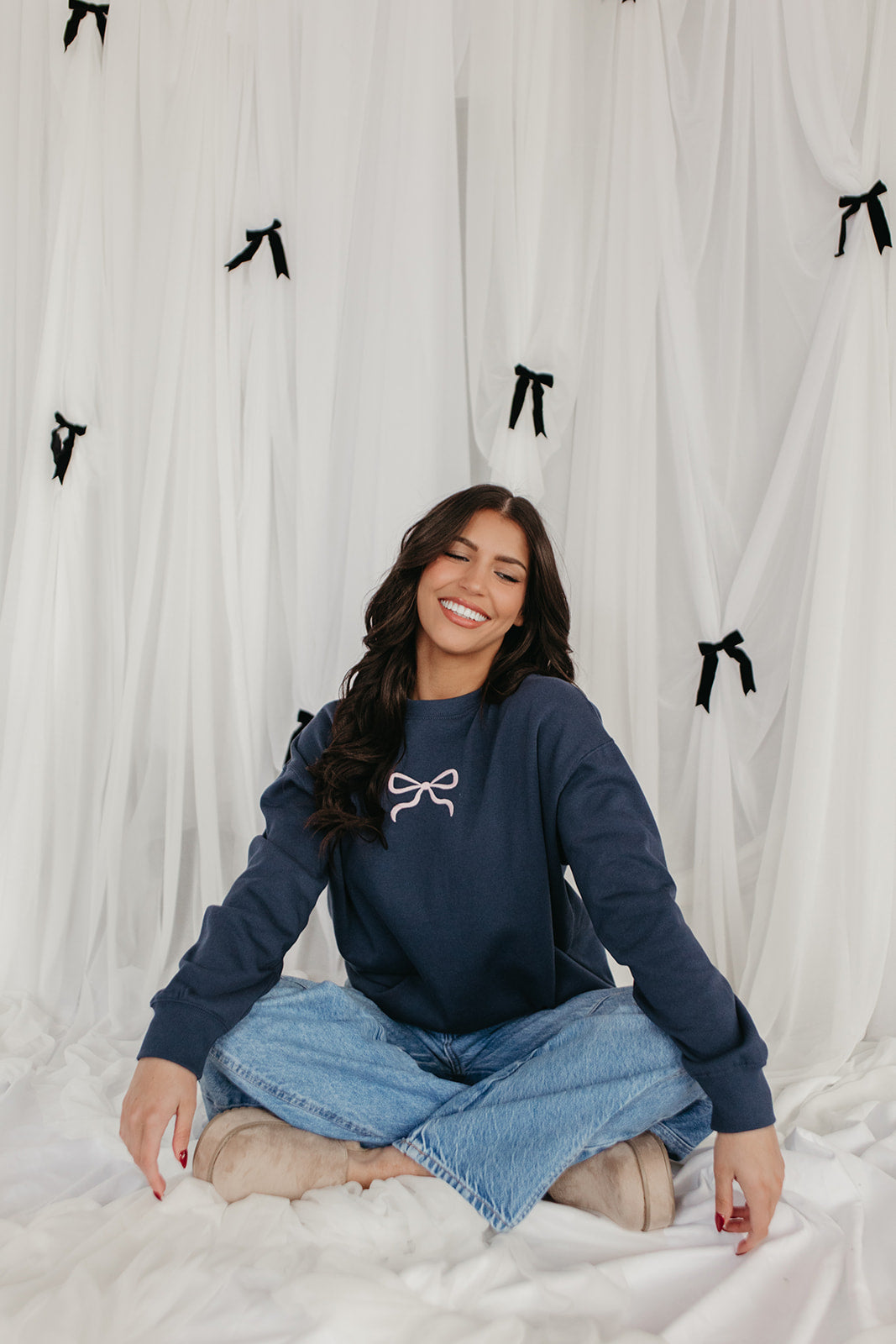 THE MILEY BOW EMBROIDERED SWEATSHIRT IN INDIGO