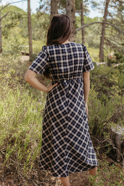 THE IVY PLAID MIDI V-NECK DRESS IN NAVY