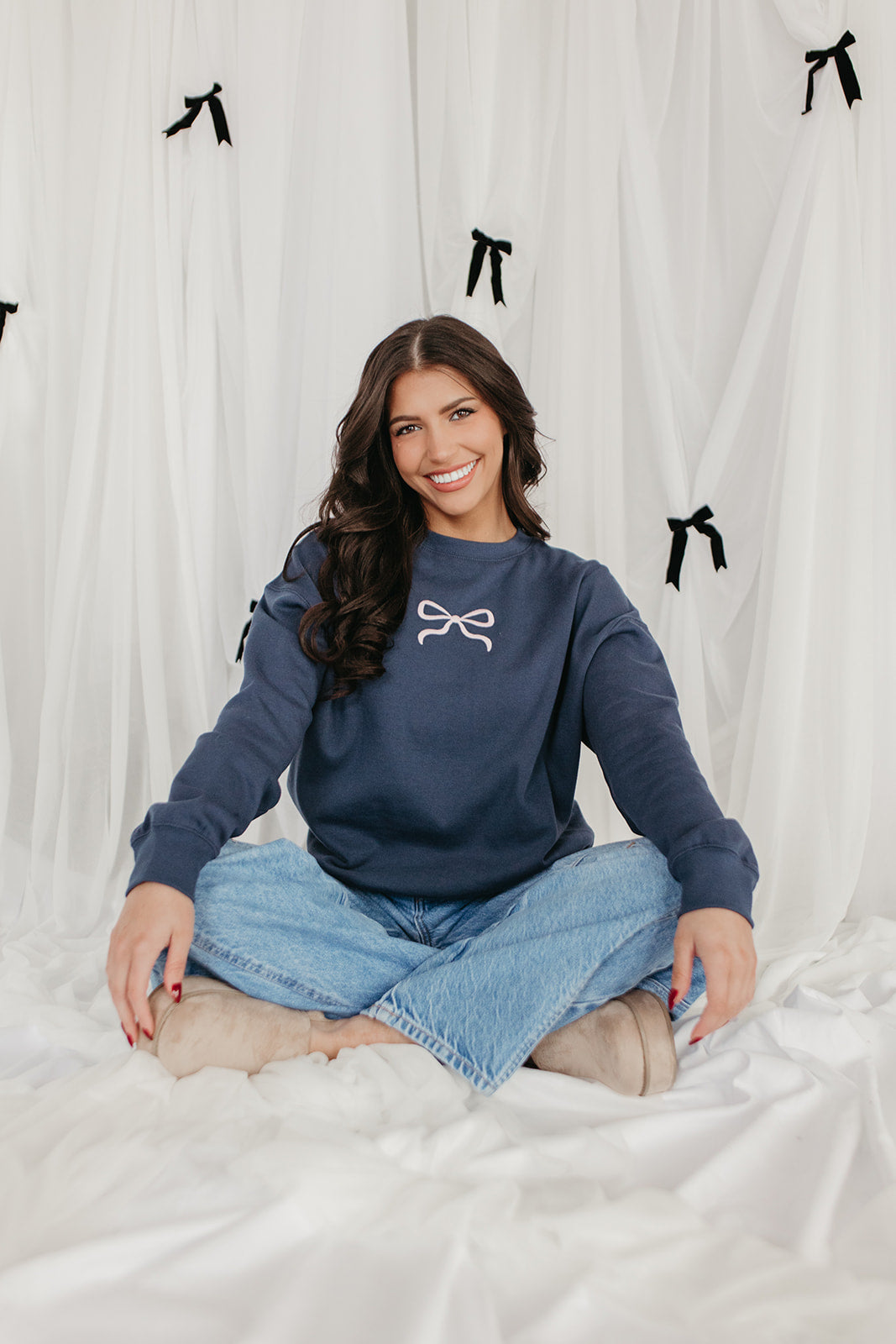 THE MILEY BOW EMBROIDERED SWEATSHIRT IN INDIGO