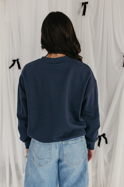 THE MILEY BOW EMBROIDERED SWEATSHIRT IN INDIGO