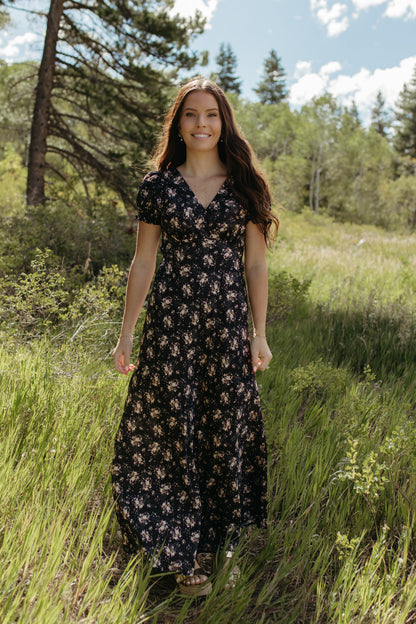 THE CELINE FLORAL MAXI V-NECK DRESS IN BLACK