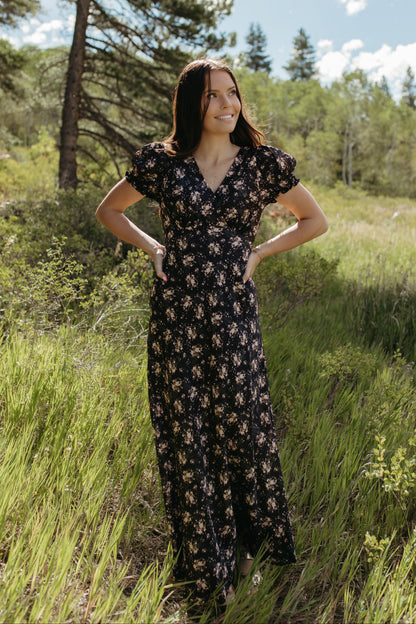 THE CELINE FLORAL MAXI V-NECK DRESS IN BLACK