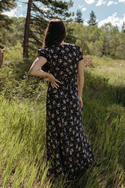 THE CELINE FLORAL MAXI V-NECK DRESS IN BLACK
