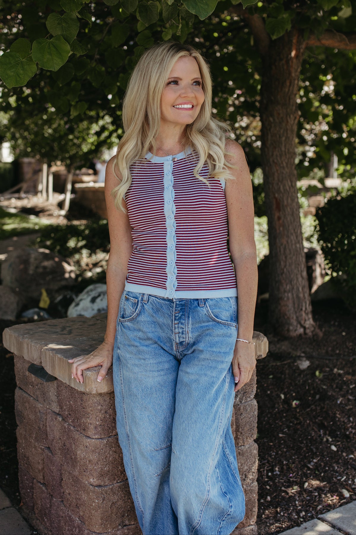 THE LORETTA STRIPE SLEEVELESS BUTTON SWEATER IN LIGHT BLUE