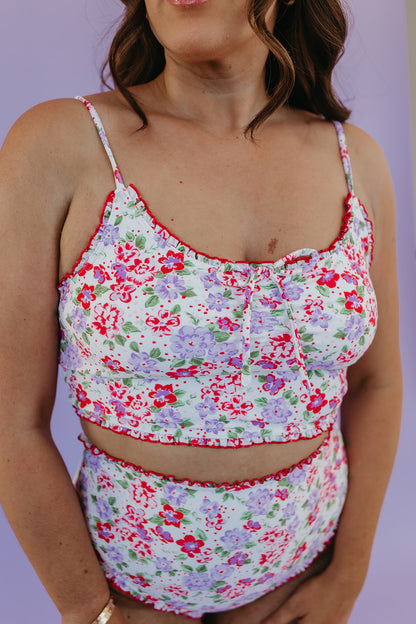RUFFLE SWIM TOP IN CORAL BLOSSOM BY PINK DESERT X SARAH TRIPP