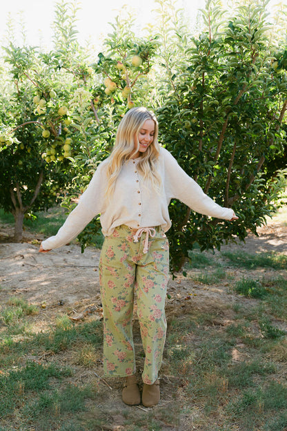 THE CHARLI FLORAL PRINT PANTS IN OLIVE