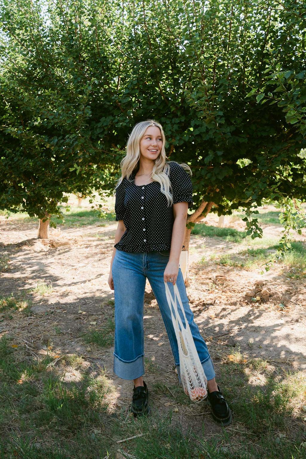 THE KRISTIE POLKA DOT BLOUSE IN BLACK