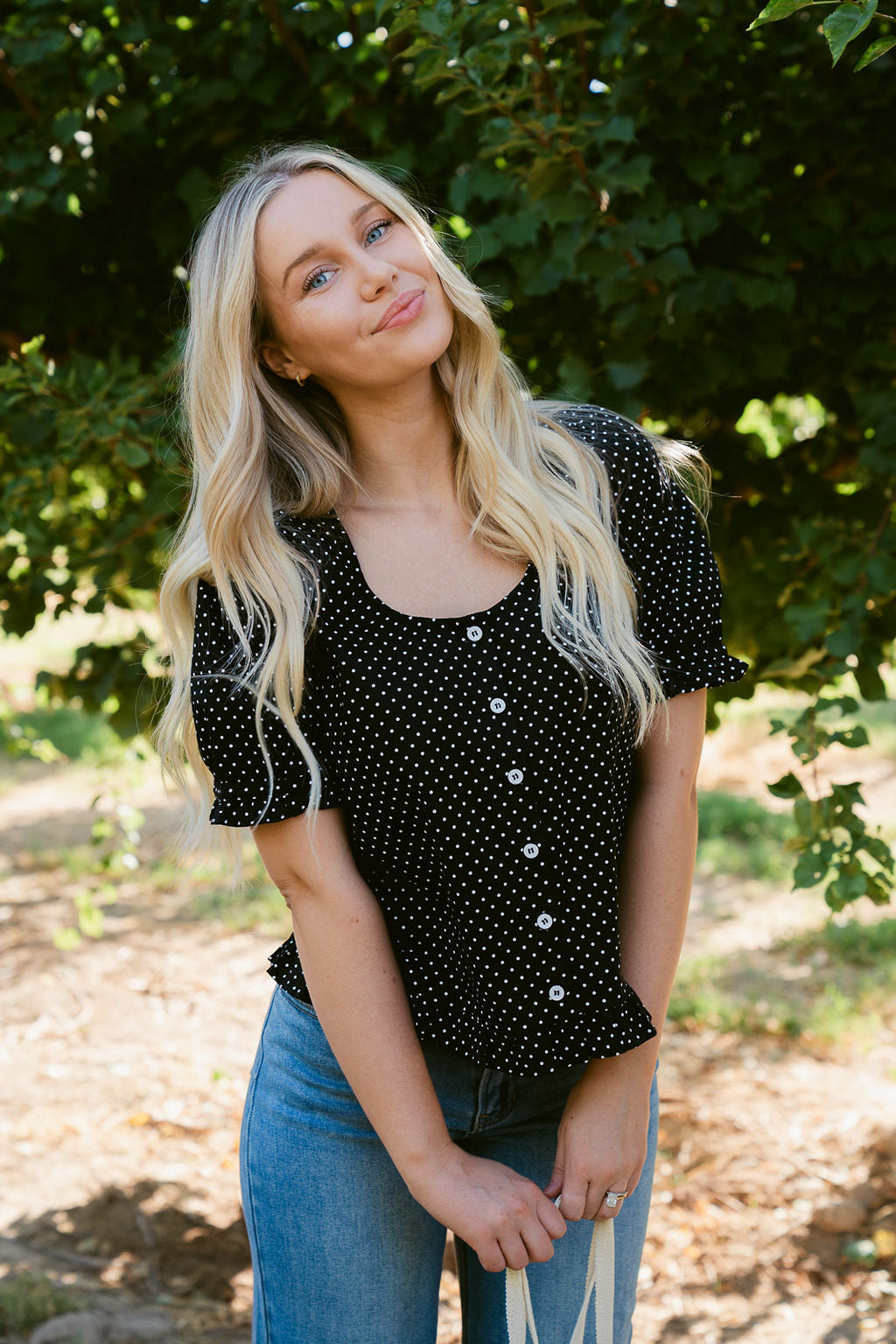 THE KRISTIE POLKA DOT BLOUSE IN BLACK