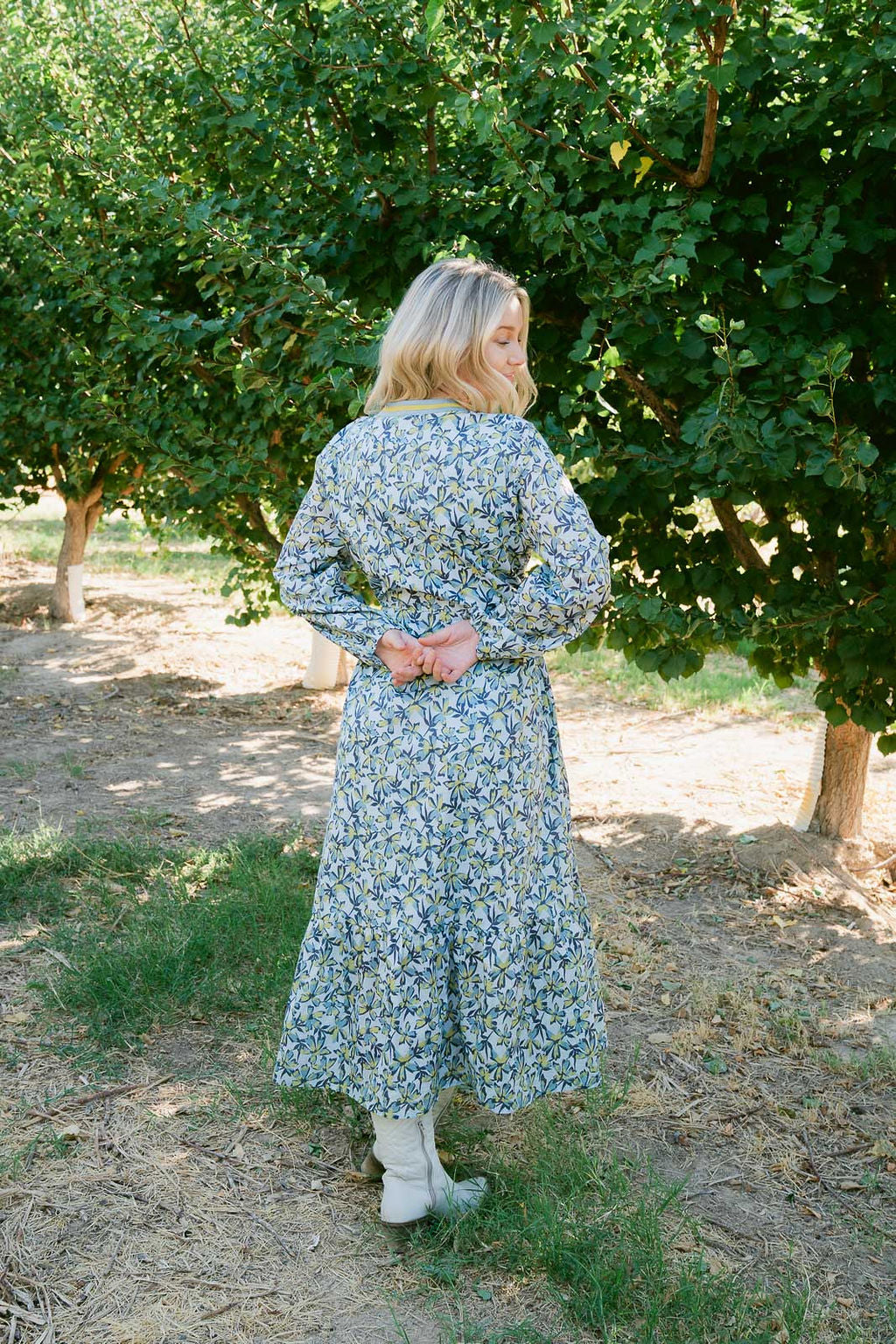 THE PAULA TIERED FLORAL DRESS IN BLUE