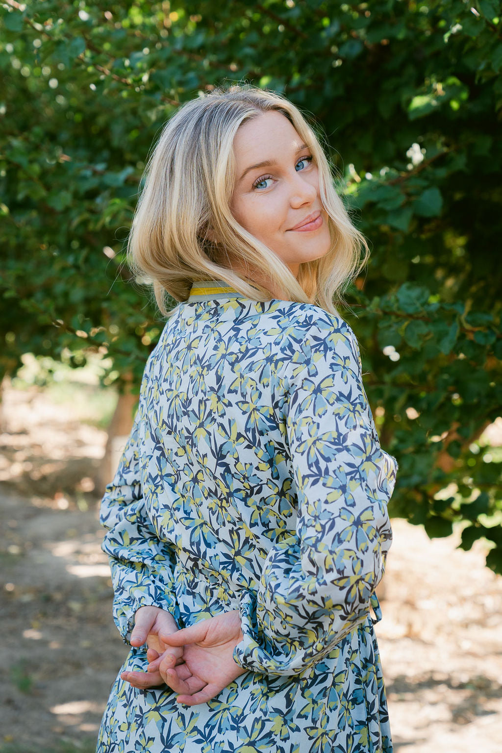THE PAULA TIERED FLORAL DRESS IN BLUE