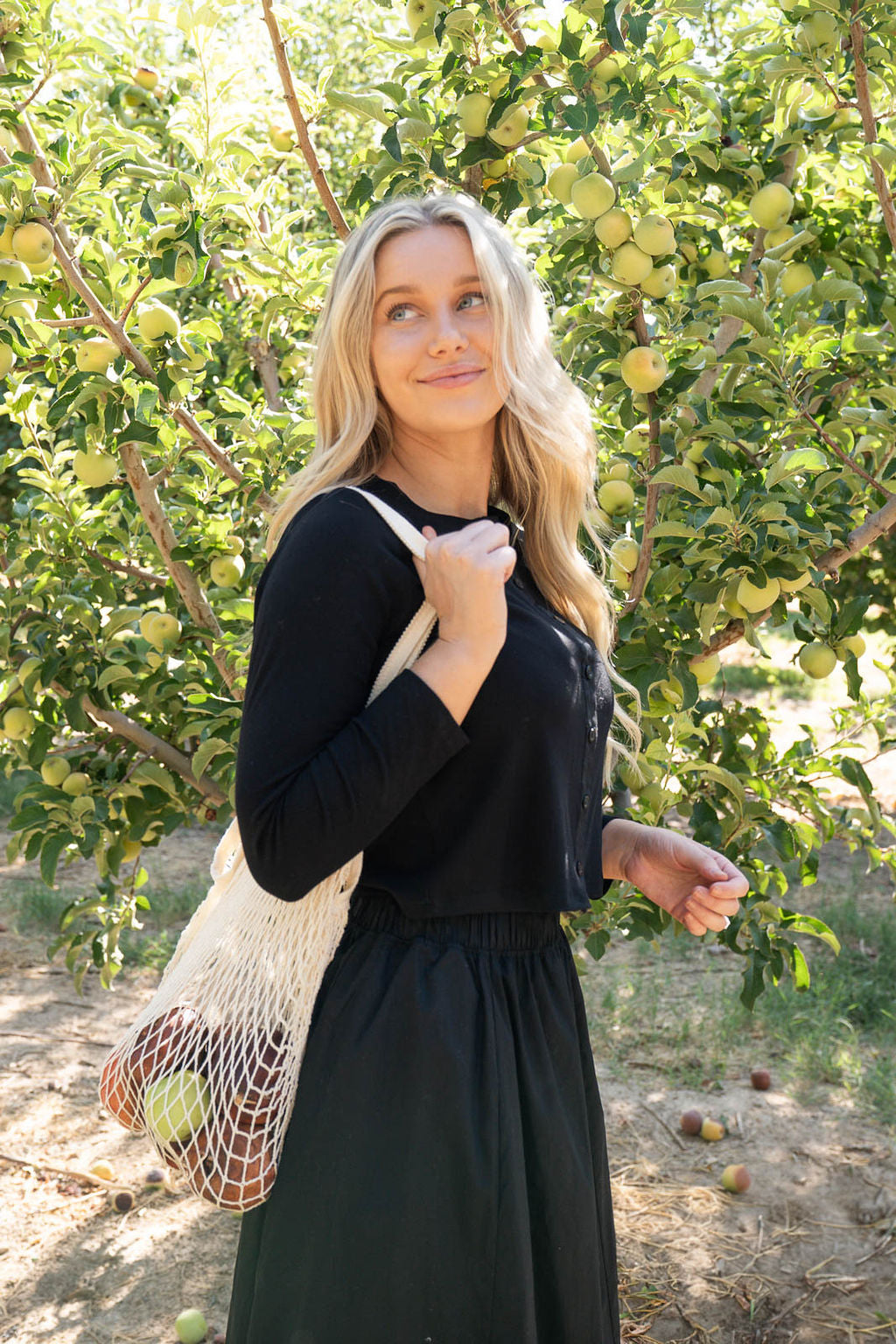 THE TRACIE CARDIGAN AND SKIRT SET IN BLACK