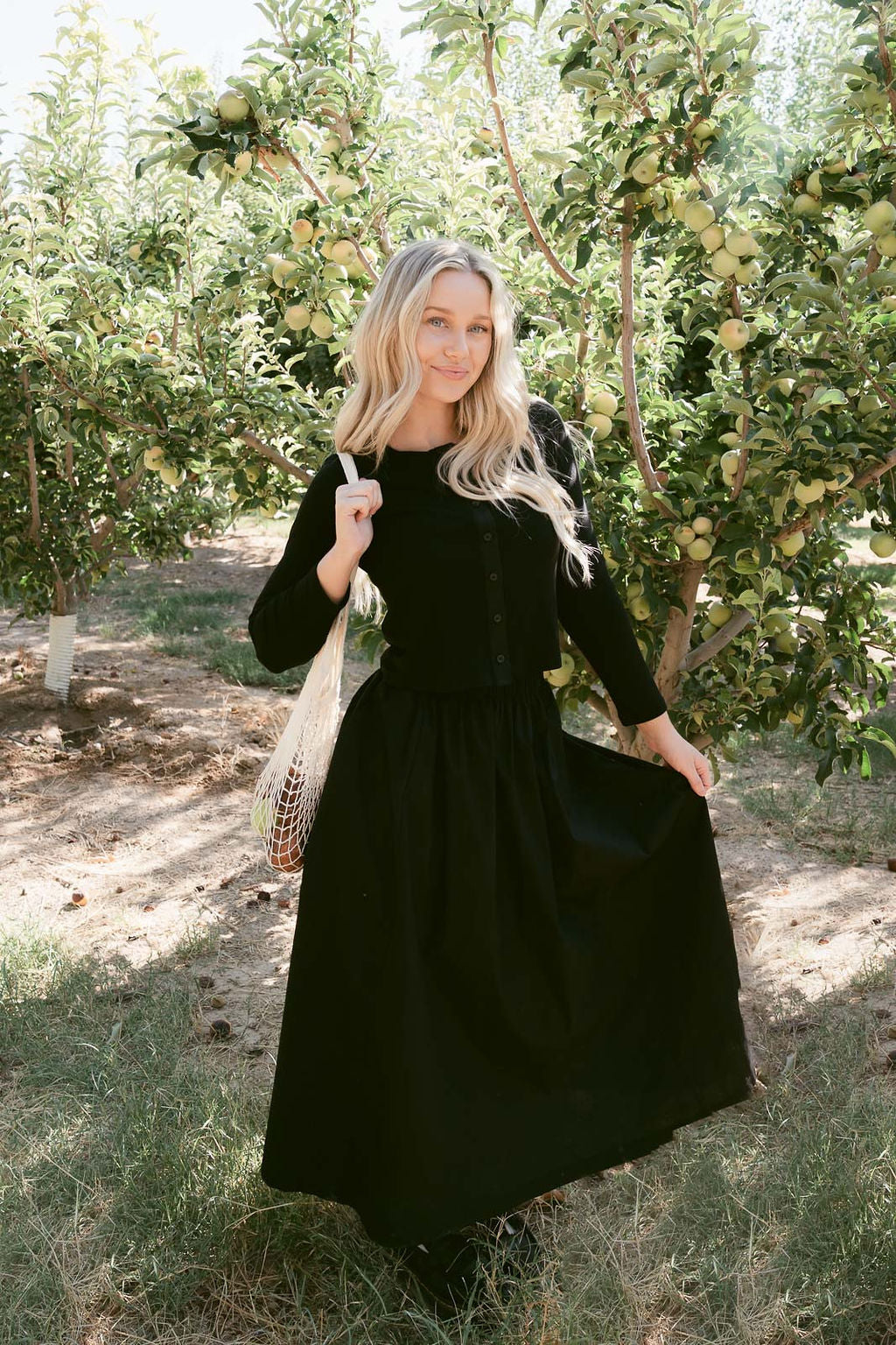 THE TRACIE CARDIGAN AND SKIRT SET IN BLACK