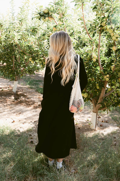 THE TRACIE CARDIGAN AND SKIRT SET IN BLACK
