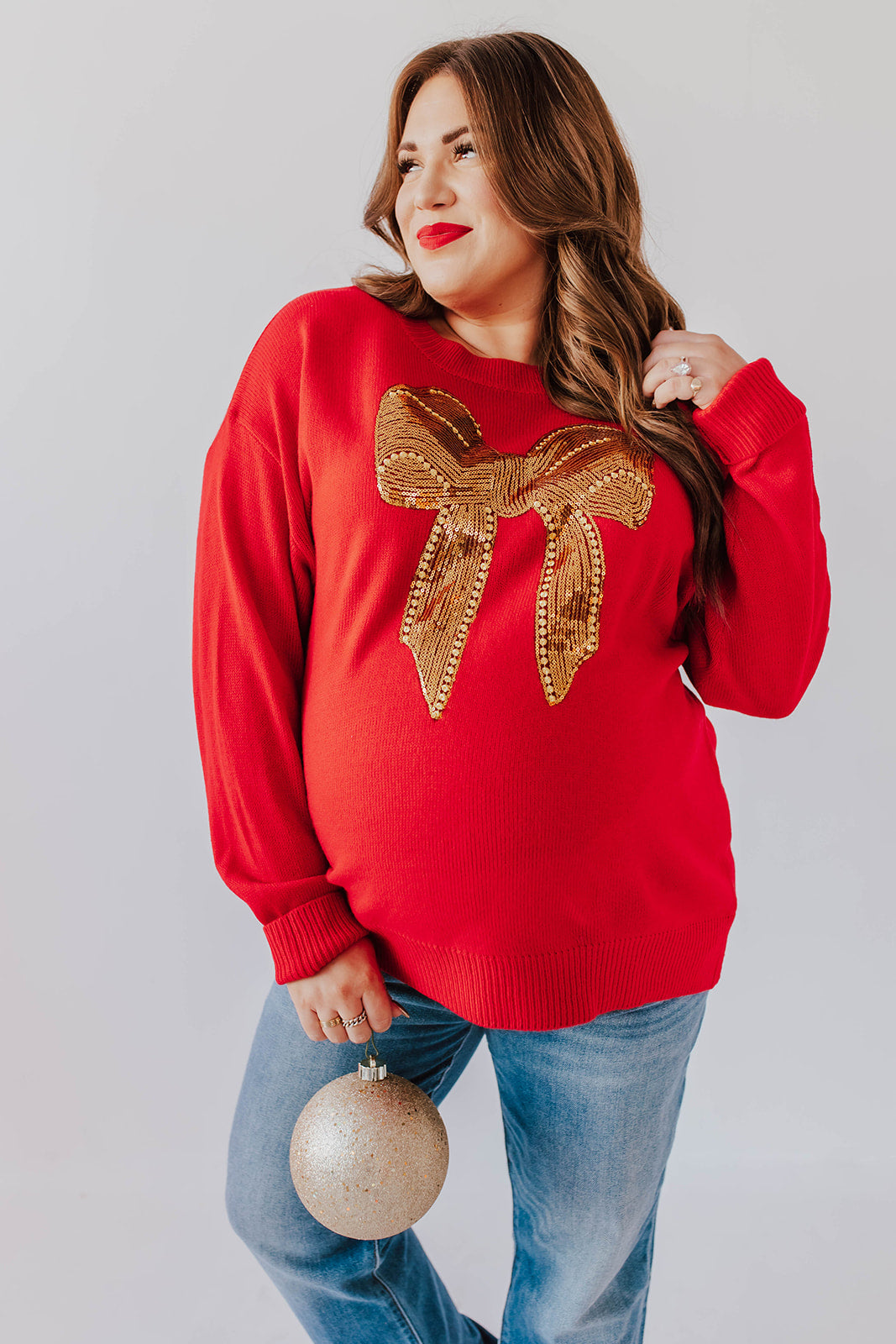 THE SEASON OF GIVING SWEATER IN RED
