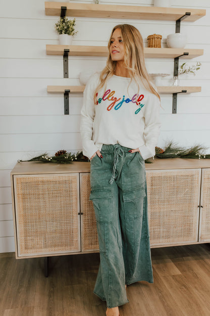 THE HOLLY JOLLY TINSEL SWEATER IN IVORY