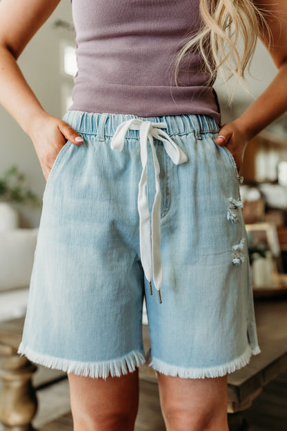 THE BLAKELY HIGH RISE BOYFRIEND SHORTS IN LIGHT DENIM