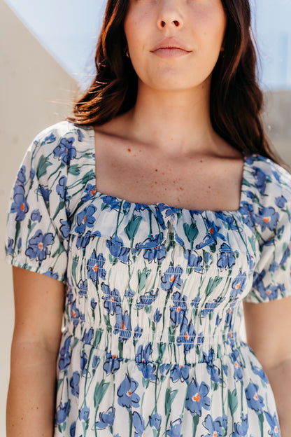 THE LEEANN FLORAL MIDI DRESS IN BLUE