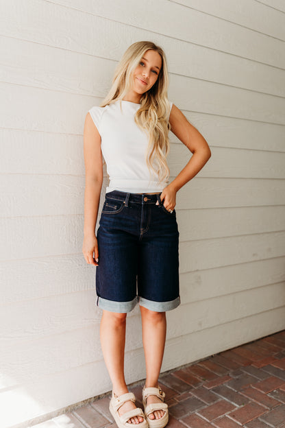 THE AINSLEY CUFFED HEM JORTS IN DARK DENIM