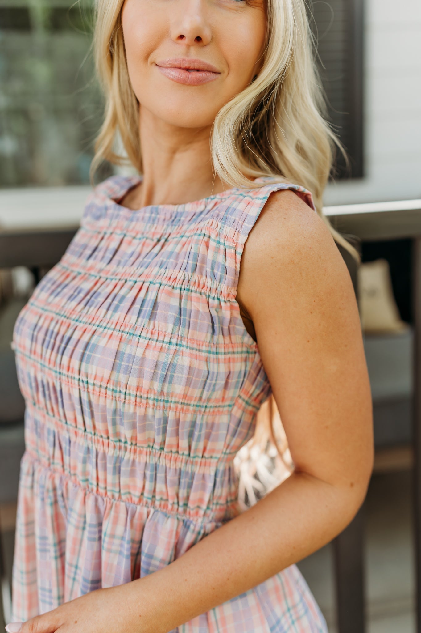 THE SAVANNAH SMOCKED PLAID DRESS IN CORAL