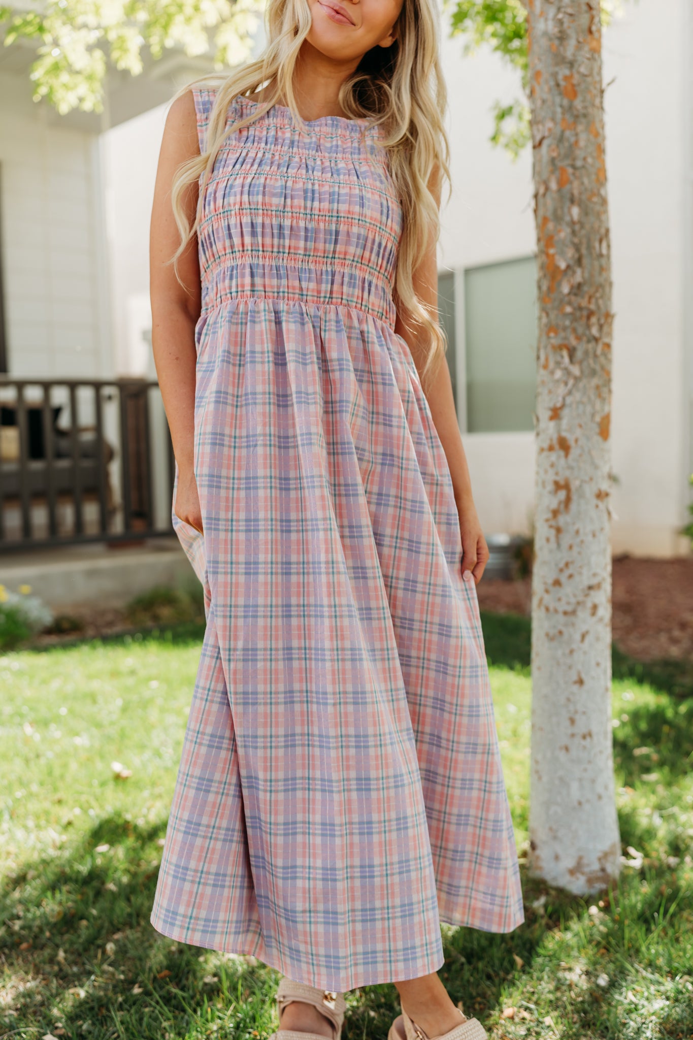 THE SAVANNAH SMOCKED PLAID DRESS IN CORAL Large