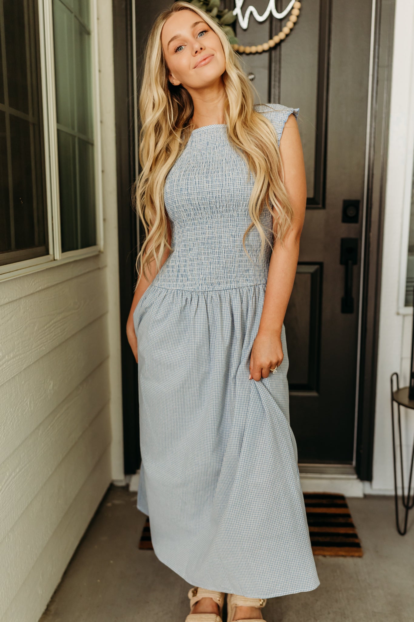 THE BLAIRE SMOCKED GINGHAM MIDI DRESS IN LIGHT BLUE