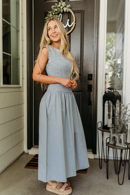 THE BLAIRE SMOCKED GINGHAM MIDI DRESS IN LIGHT BLUE