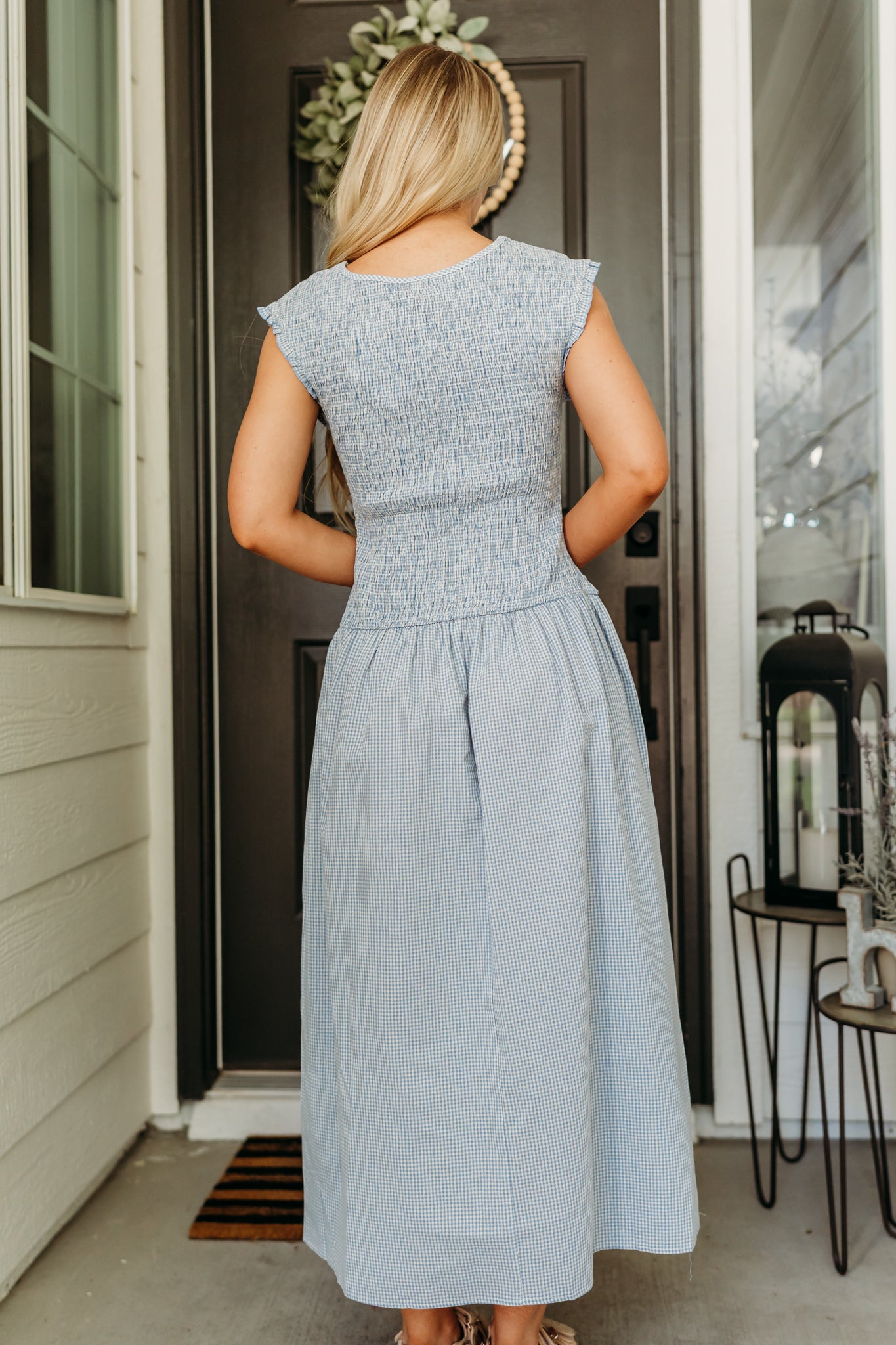 THE BLAIRE SMOCKED GINGHAM MIDI DRESS IN LIGHT BLUE