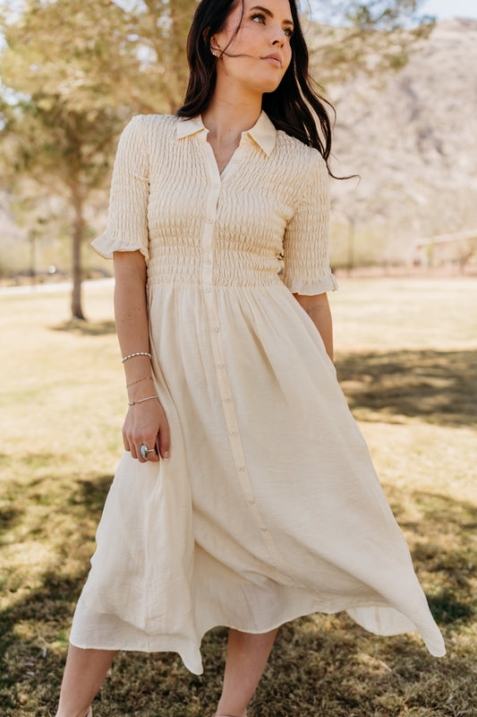 THE CRESSIDA SMOCKED MIDI DRESS IN CREAM