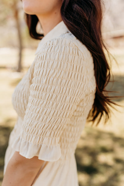 THE CRESSIDA SMOCKED MIDI DRESS IN CREAM